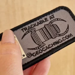Emblema Geocaching rastreável